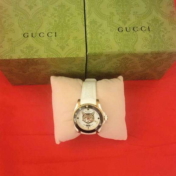 Authentic Gucci Women's Watch with White Band and Silver Details